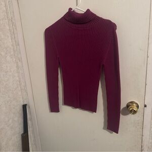 Fushia size medium turtleneck sweater. Never worn.